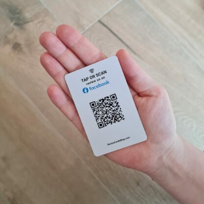 facebook review card with nfc and qr in hand